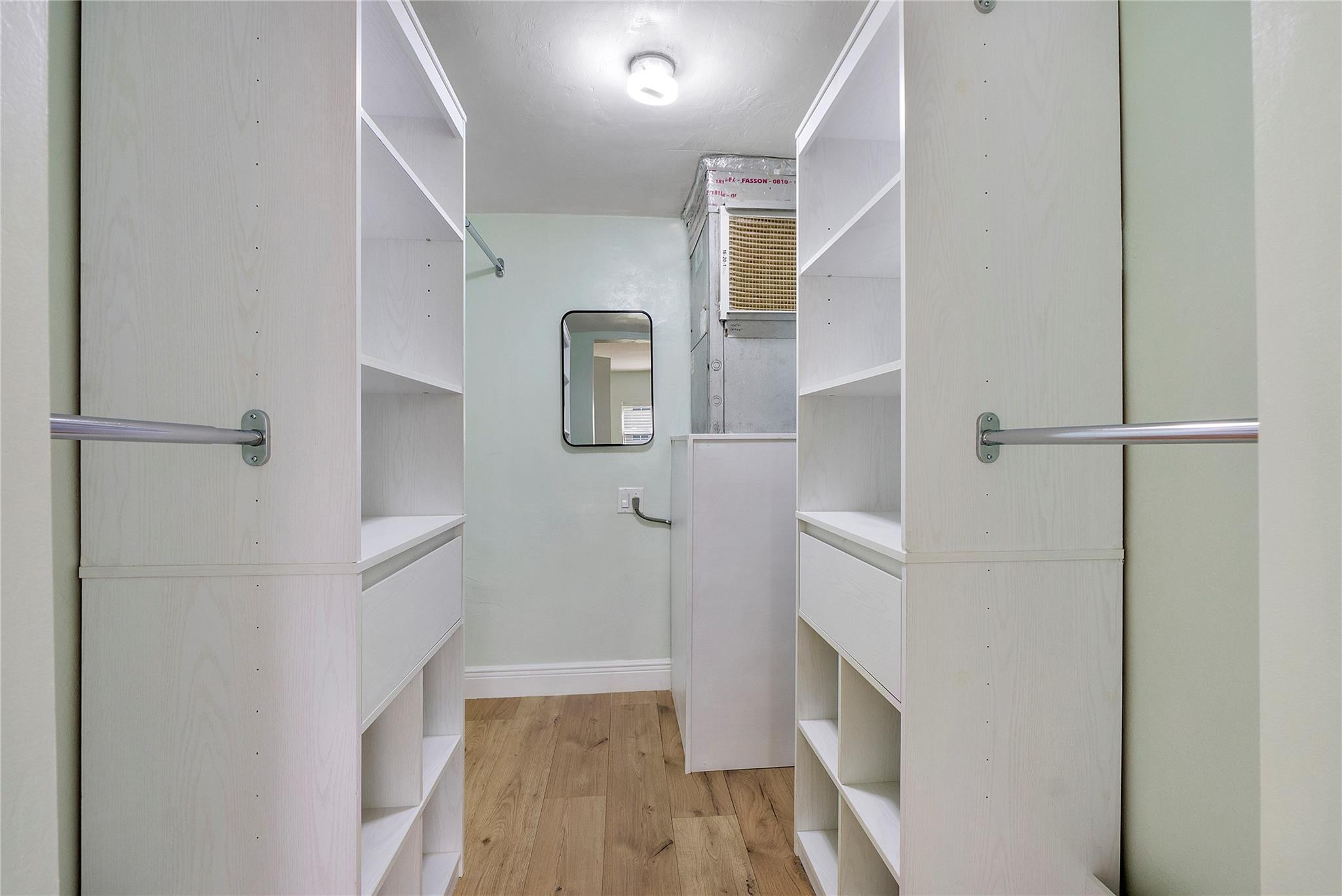 1951 Northeast 39th Street, Unit 156 Lighthouse Point, FL 33064 - Photo 17 of 43 walk in closet main bedroom