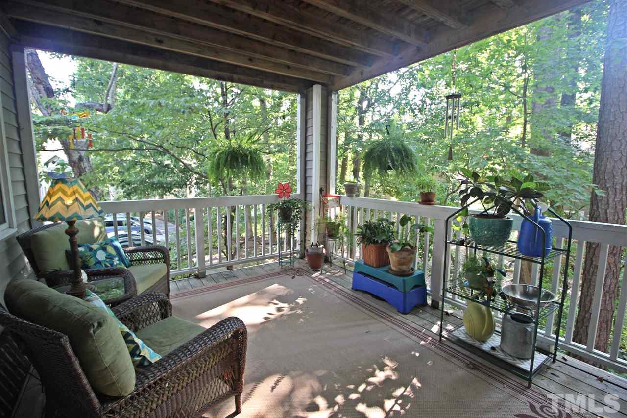 921 Springfork Drive Cary, NC 27513 - Photo 19 of 22 a outdoor living space with furniture and garden view