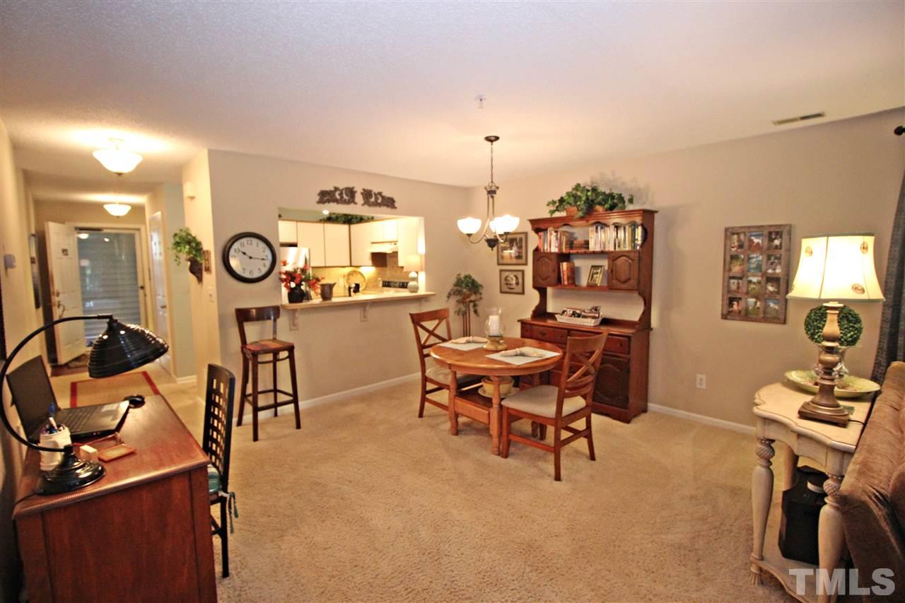 921 Springfork Drive Cary, NC 27513 - Photo 8 of 22 a view of a workspace with furniture and a window