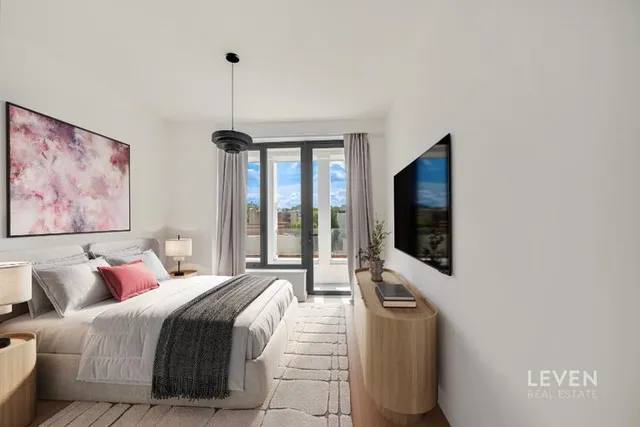a kitchen with cabinets appliances and a sink