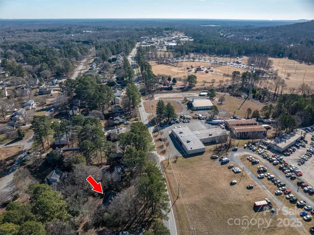 a view of a house with wooden deck