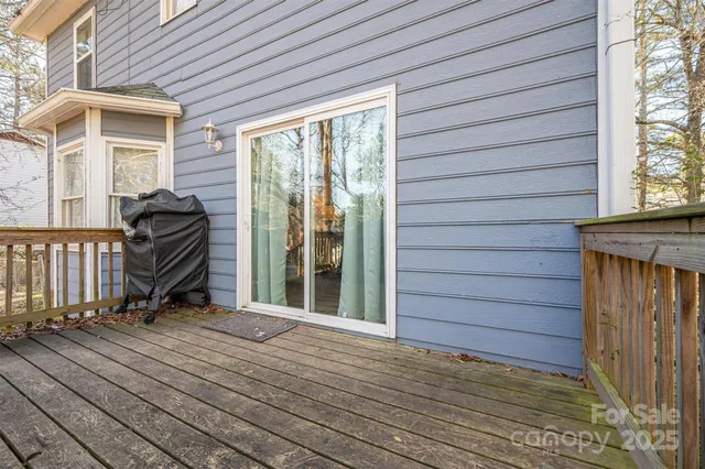 a view of wooden floor in front of a house