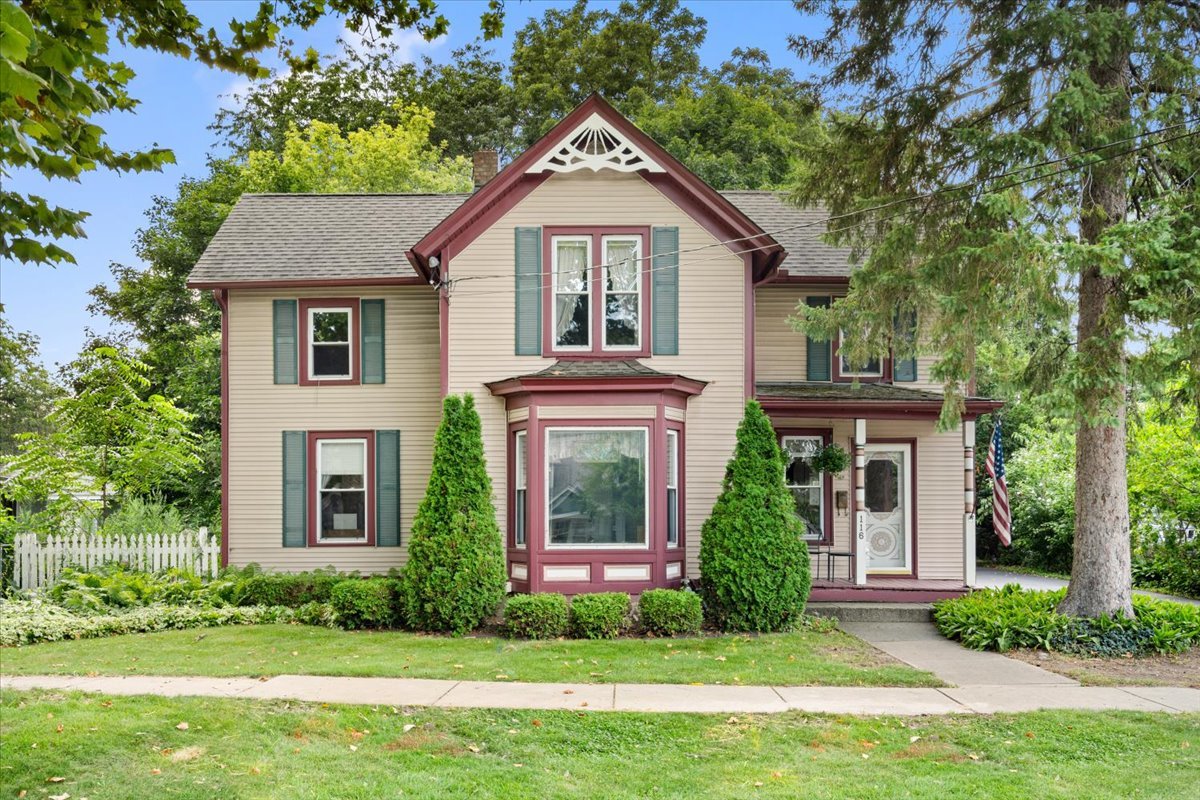 front view of a house and a yard