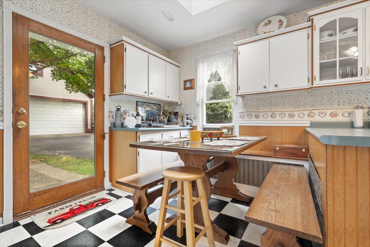 116 Spring Street Cary, IL 60013 - Photo 15 of 45 a kitchen with a sink a stove and a microwave