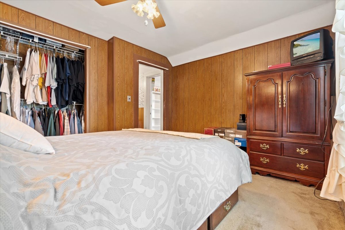 116 Spring Street Cary, IL 60013 - Photo 23 of 45 a bedroom with a bed and a closet