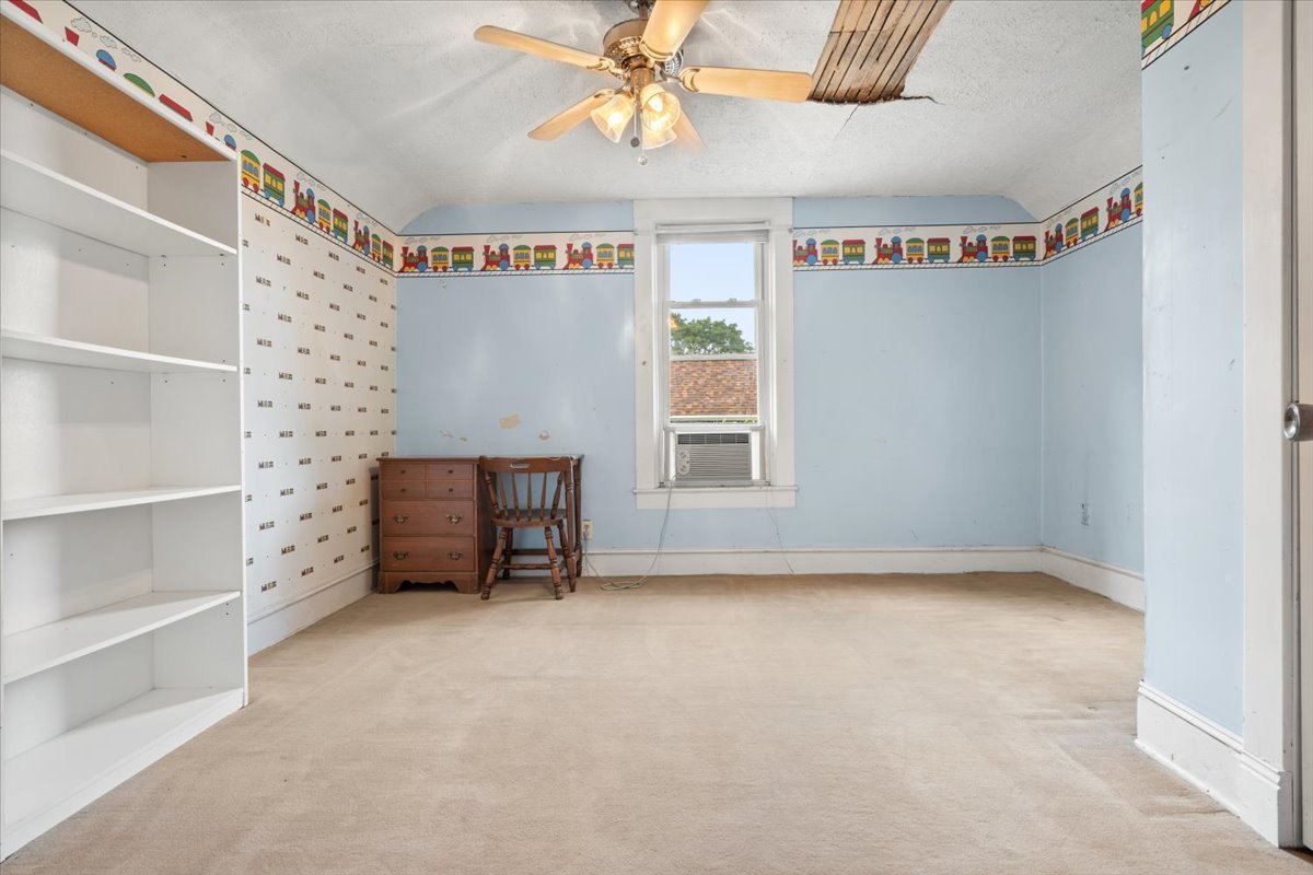 116 Spring Street Cary, IL 60013 - Photo 24 of 45 a view of an empty room with a window
