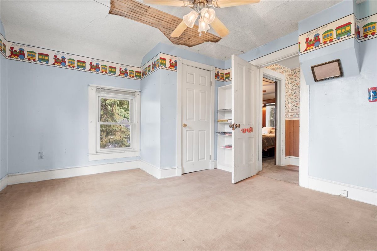 116 Spring Street Cary, IL 60013 - Photo 25 of 45 an empty room with windows