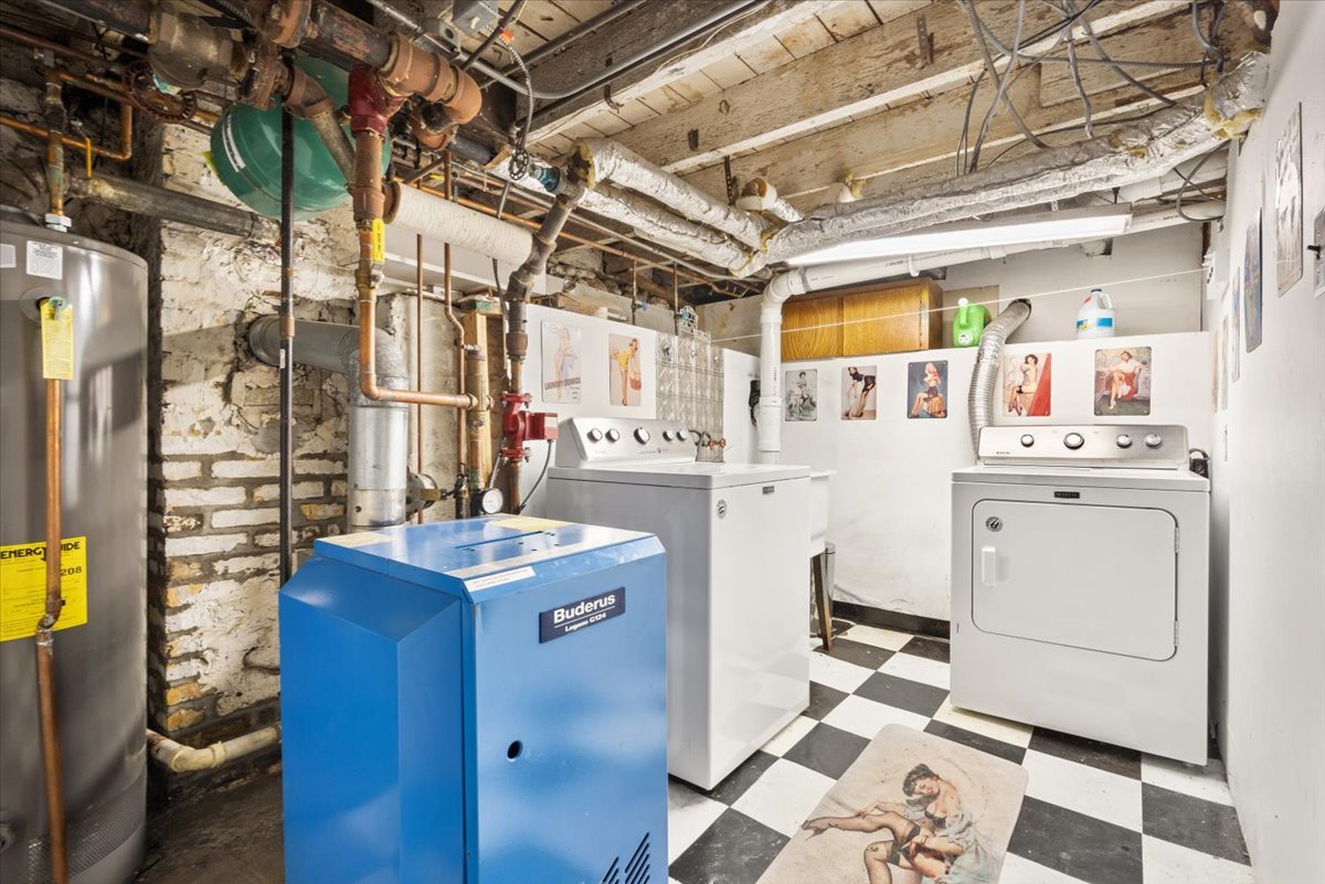 116 Spring Street Cary, IL 60013 - Photo 29 of 45 a utility room with dryer and washer