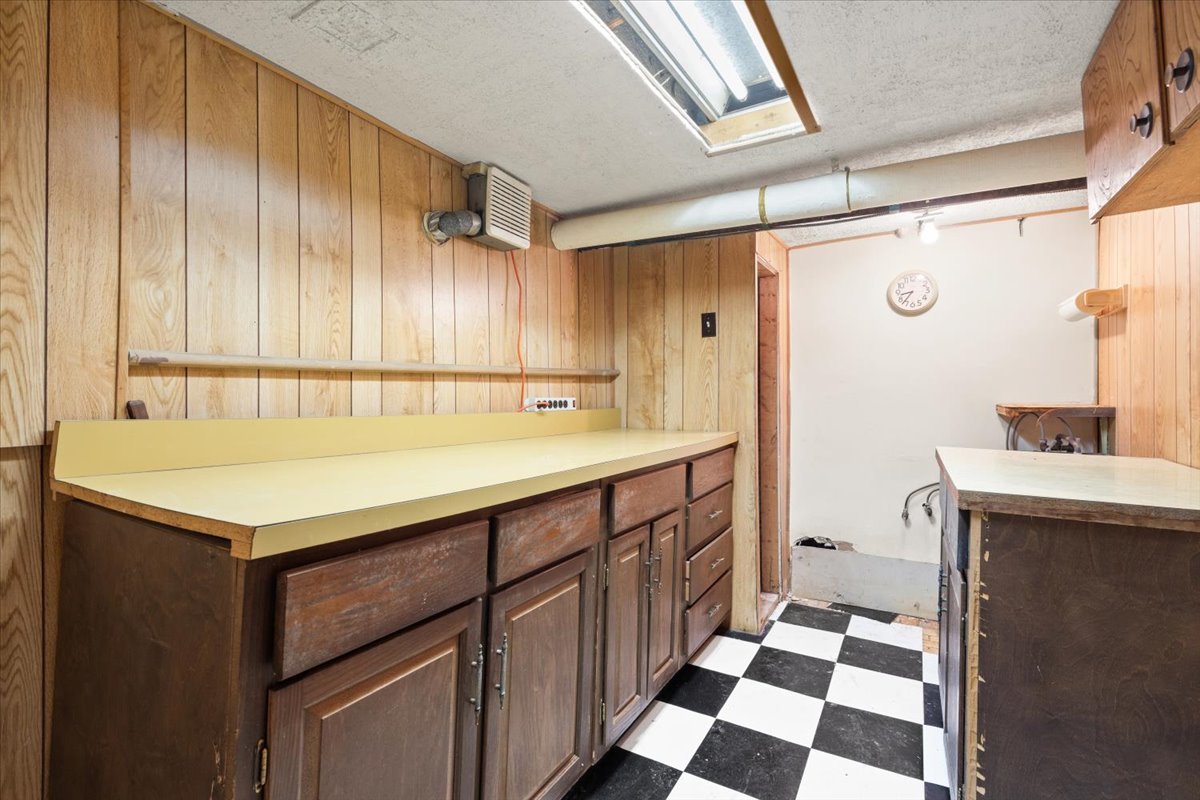 116 Spring Street Cary, IL 60013 - Photo 30 of 45 a bathroom with a sink and a mirror