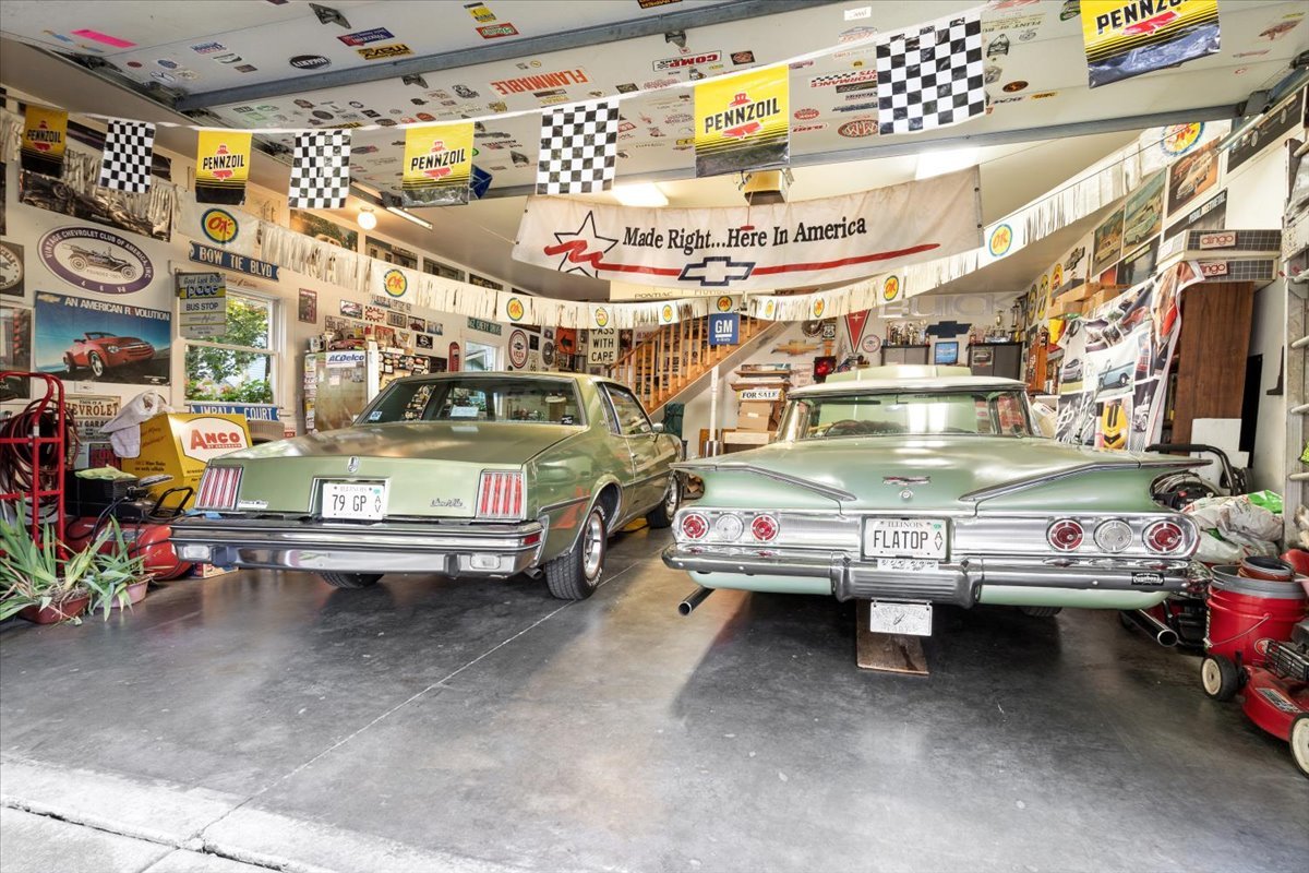 116 Spring Street Cary, IL 60013 - Photo 32 of 45 a view of parking garage with cars
