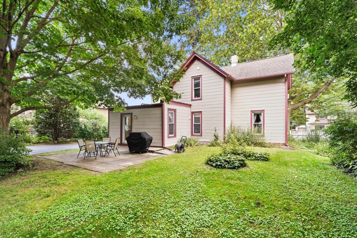 116 Spring Street Cary, IL 60013 - Photo 35 of 45 a view of a house with a yard and sitting area