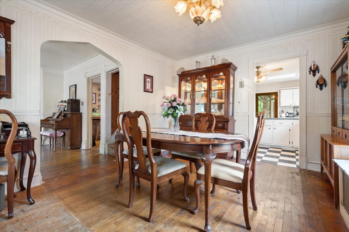 116 Spring Street Cary, IL 60013 - Photo 9 of 45 a view of a dining room with furniture window and wooden floor