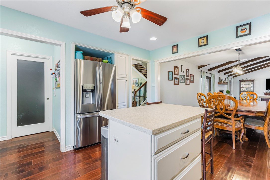 3350 Mavis Drive Corpus Christi, TX 78411 - Photo 12 of 40 a kitchen that has a table chairs and a refrigerator
