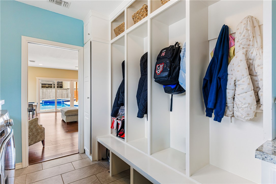 3350 Mavis Drive Corpus Christi, TX 78411 - Photo 18 of 40 a view of walk in closet with clothes and shoes