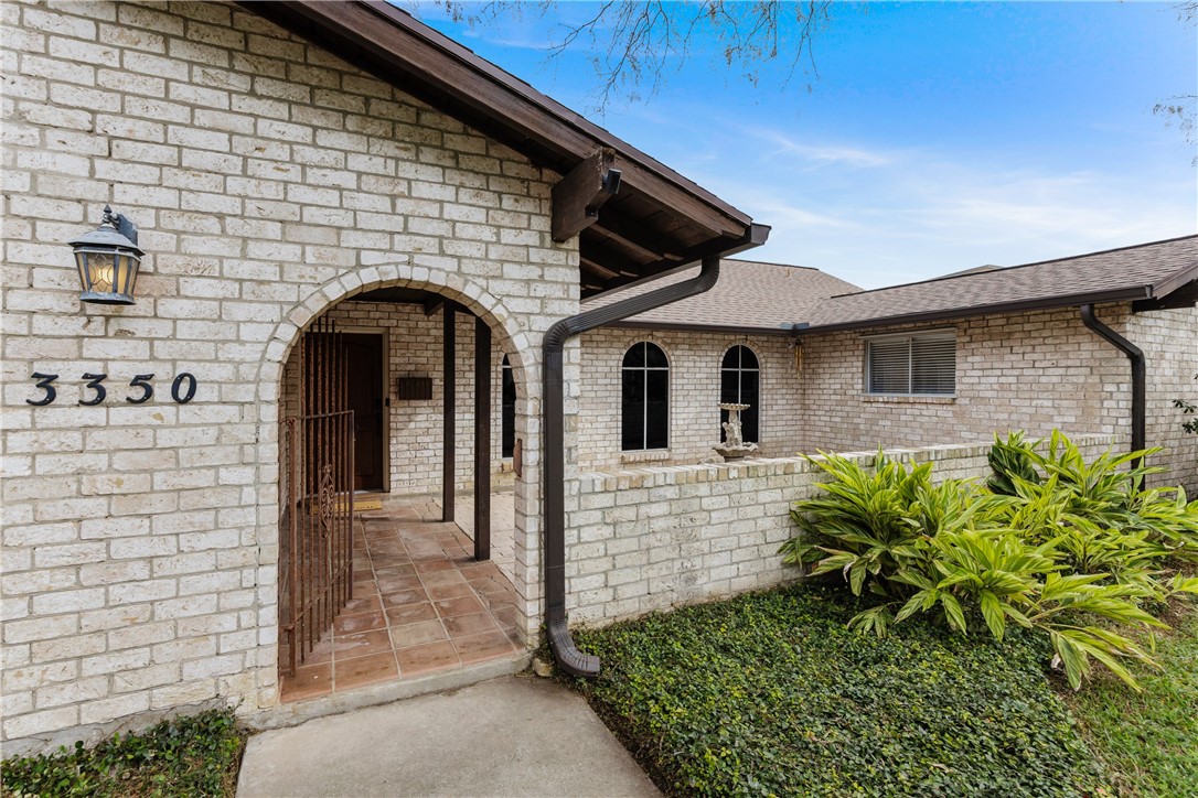3350 Mavis Drive Corpus Christi, TX 78411 - Photo 2 of 40 a front view of a house with garden