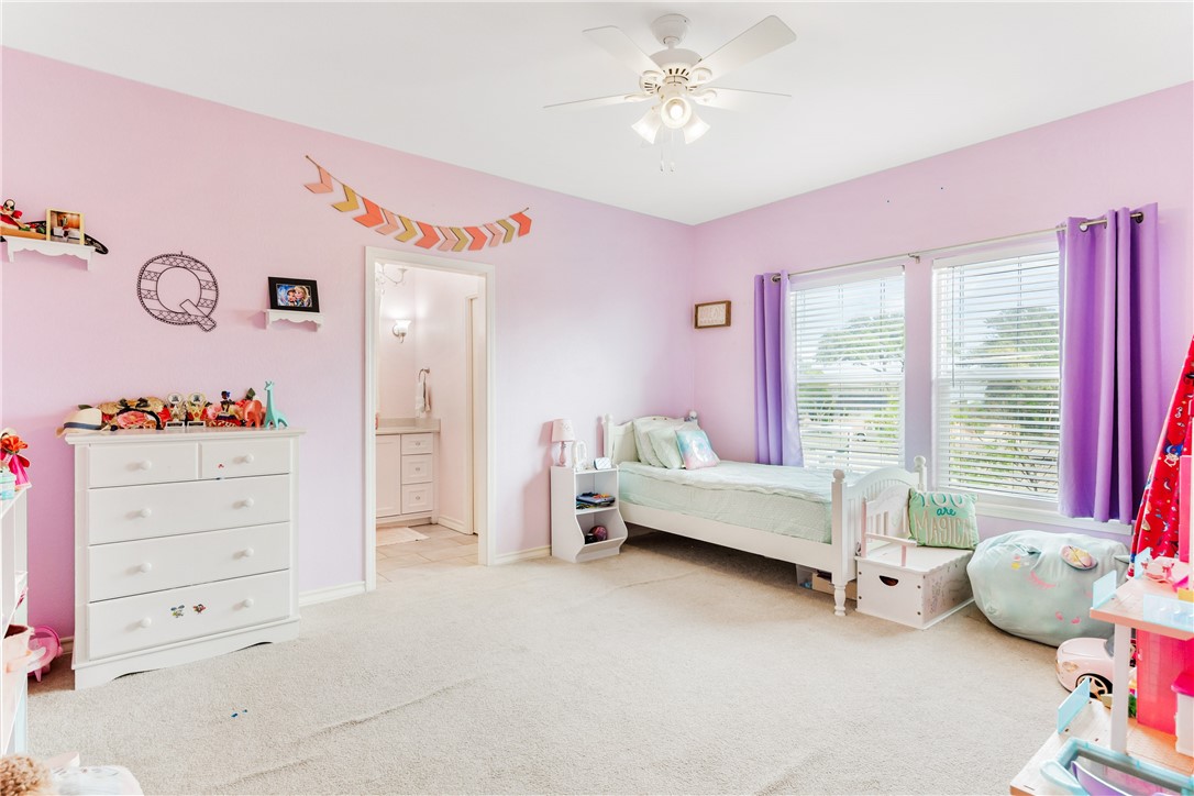 3350 Mavis Drive Corpus Christi, TX 78411 - Photo 34 of 40 a bedroom with furniture and a large window