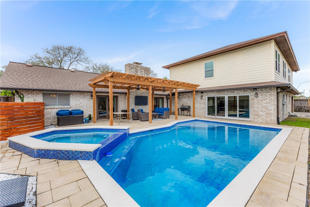 3350 Mavis Drive Corpus Christi, TX 78411 - Photo 38 of 40 a view of a house with pool and chairs