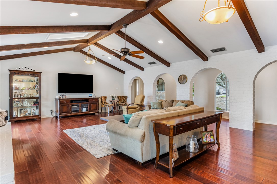 3350 Mavis Drive Corpus Christi, TX 78411 - Photo 4 of 40 a living room with fireplace furniture and a flat screen tv