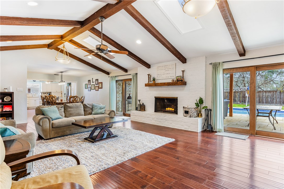 3350 Mavis Drive Corpus Christi, TX 78411 - Photo 6 of 40 a living room with furniture and a fireplace