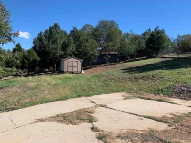 17461 Harrison Park Road Julian, CA 92036 - Photo 16 of 22 a view of a tiny house with a yard