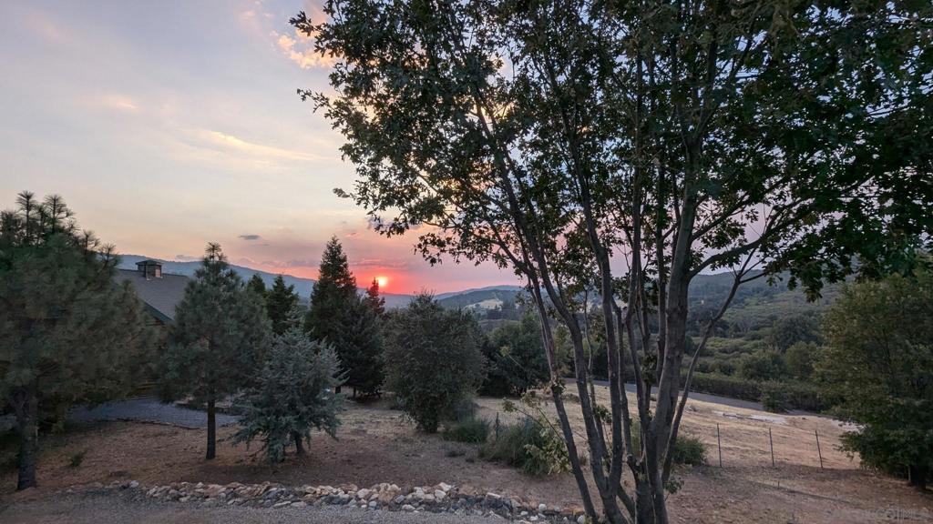 17461 Harrison Park Road Julian, CA 92036 - Photo 4 of 22 a view of a city with lush green forest