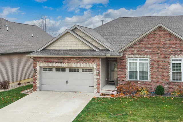 a view of house with yard