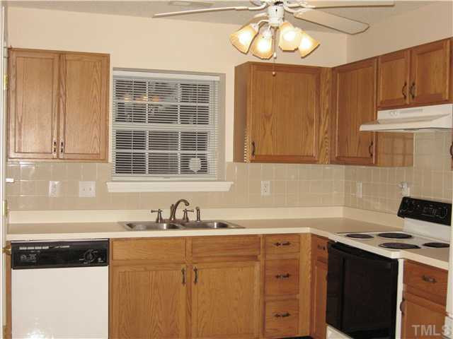 4906 Gable Ridge Drive Durham, NC 27713 - Photo 6 of 24 Double Stainless Sinks, Dishwasher, Range with hood/light/fan. Garden Window. Kitchen