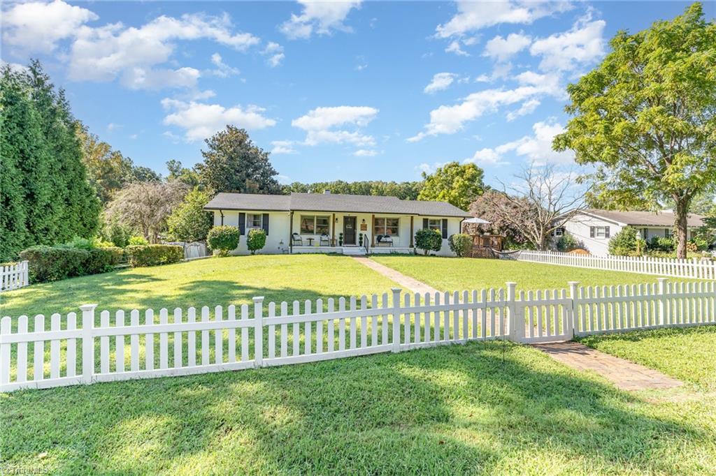 2606 Wexford Place High Point, NC 27265 - Photo 26 of 30 this white picket fence gives all of the cozy vibes