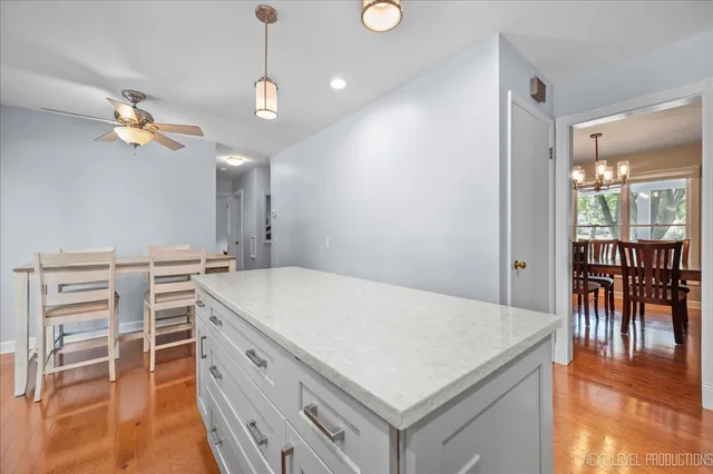 a kitchen that has a cabinets a sink and a stove