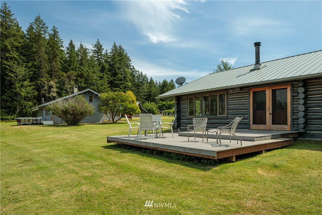 257 Cross Road Lopez Island, WA 98261 - Photo 22 of 28 a view of a house with swimming pool and sitting area
