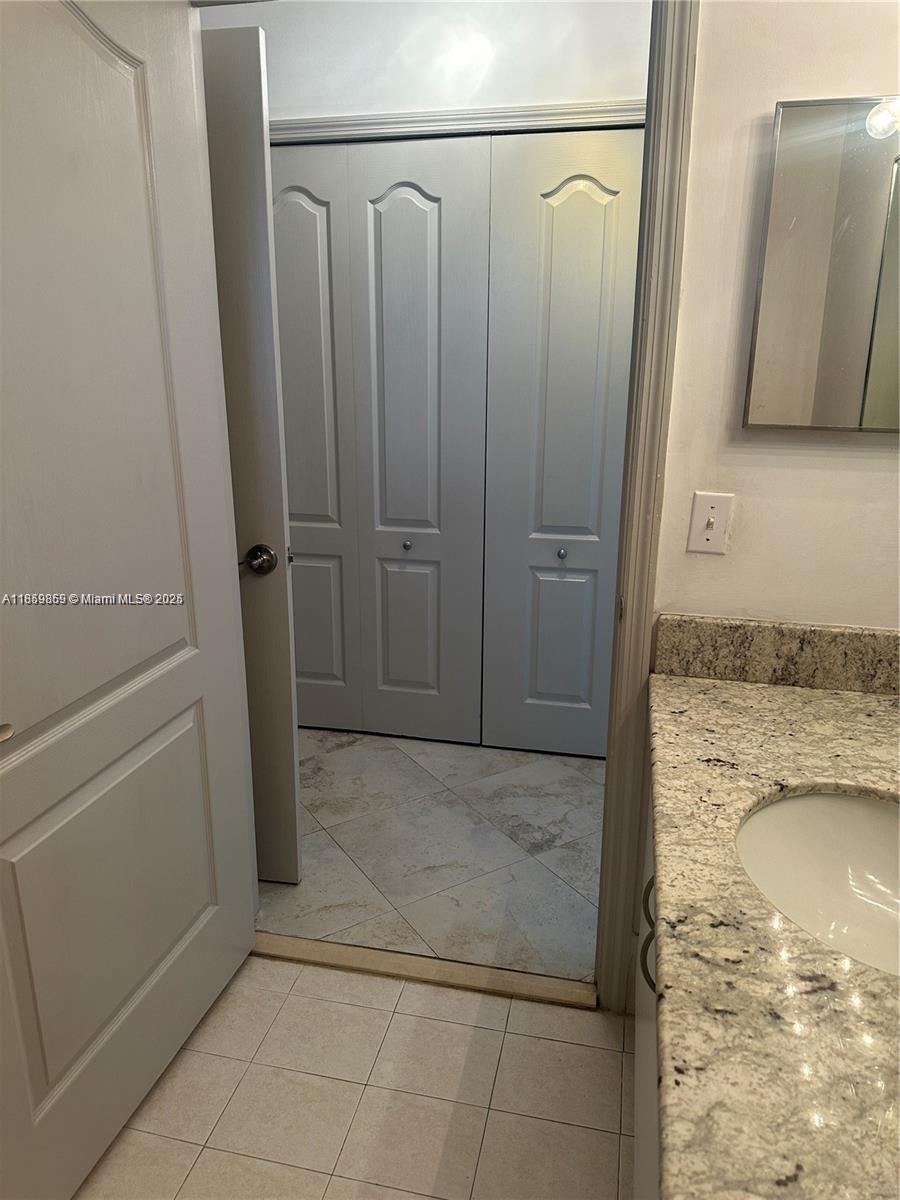 2400 Southwest 27th Avenue, Unit 406 Miami, FL 33145 - Photo 11 of 31 a view of walk in closet