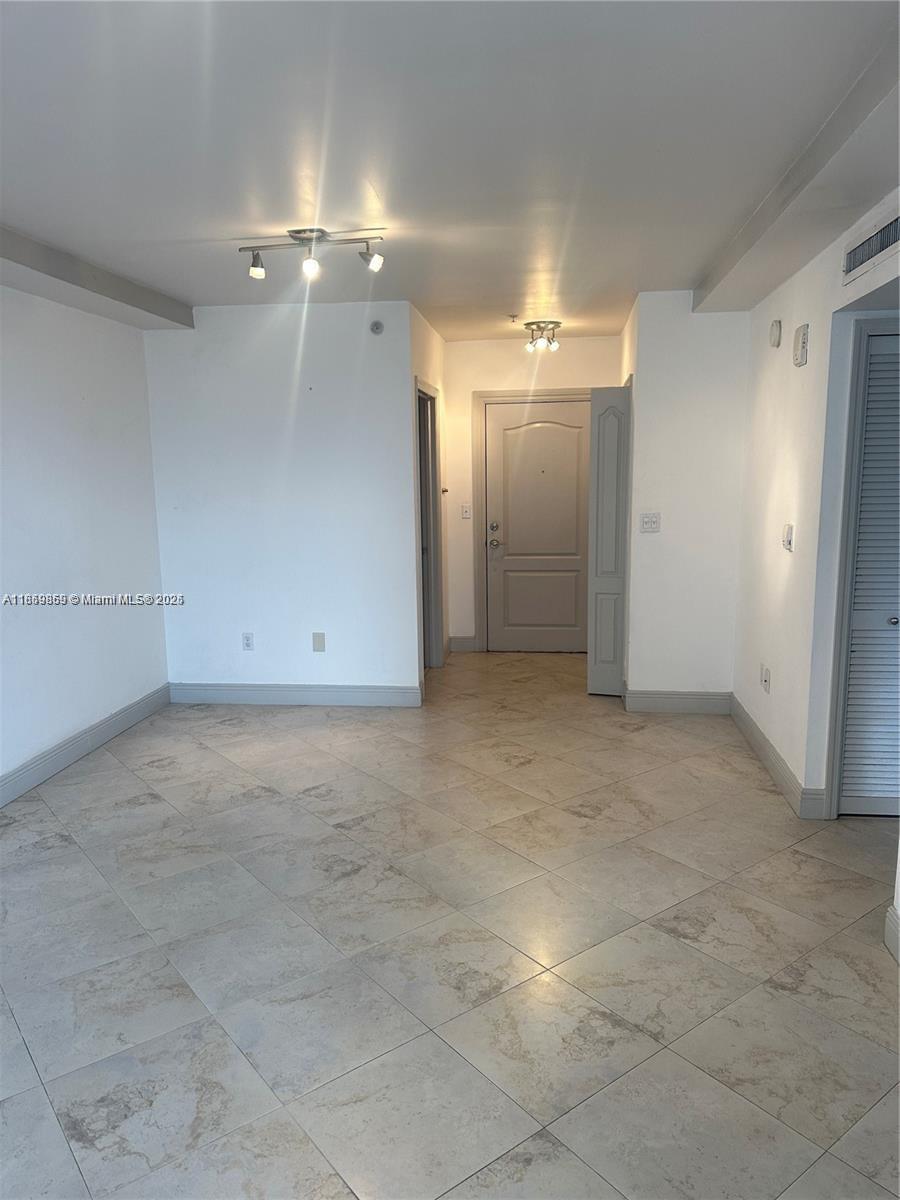 2400 Southwest 27th Avenue, Unit 406 Miami, FL 33145 - Photo 24 of 31 a view of an empty room