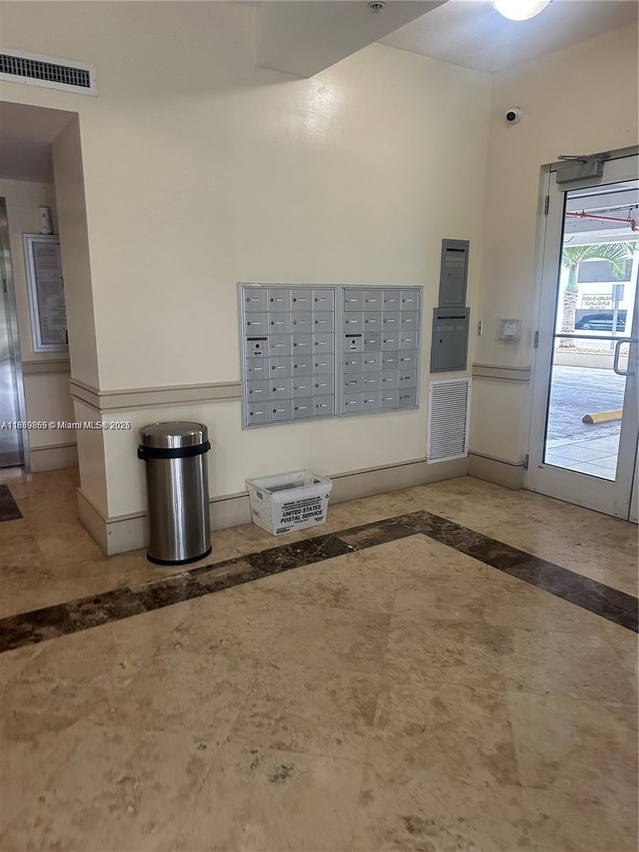 2400 Southwest 27th Avenue, Unit 406 Miami, FL 33145 - Photo 31 of 31 a view of a refrigerator a sink and a stove