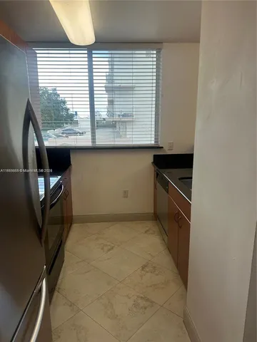 $330,000 | 2400 Southwest 27th Avenue, Unit 406, Miami, FL 33145