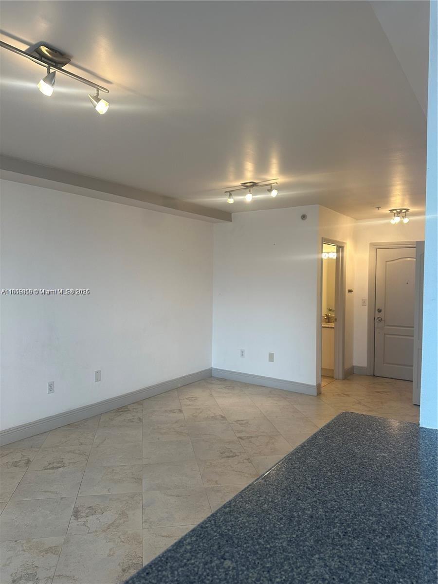 2400 Southwest 27th Avenue, Unit 406 Miami, FL 33145 - Photo 7 of 31 a view of an empty room