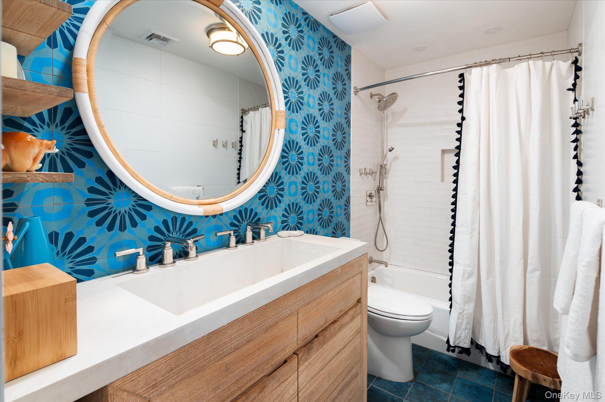 27 Mohawk Lane Baldwin Place, NY 10505 - Photo 23 of 38 a bathroom with a sink a toilet and a mirror