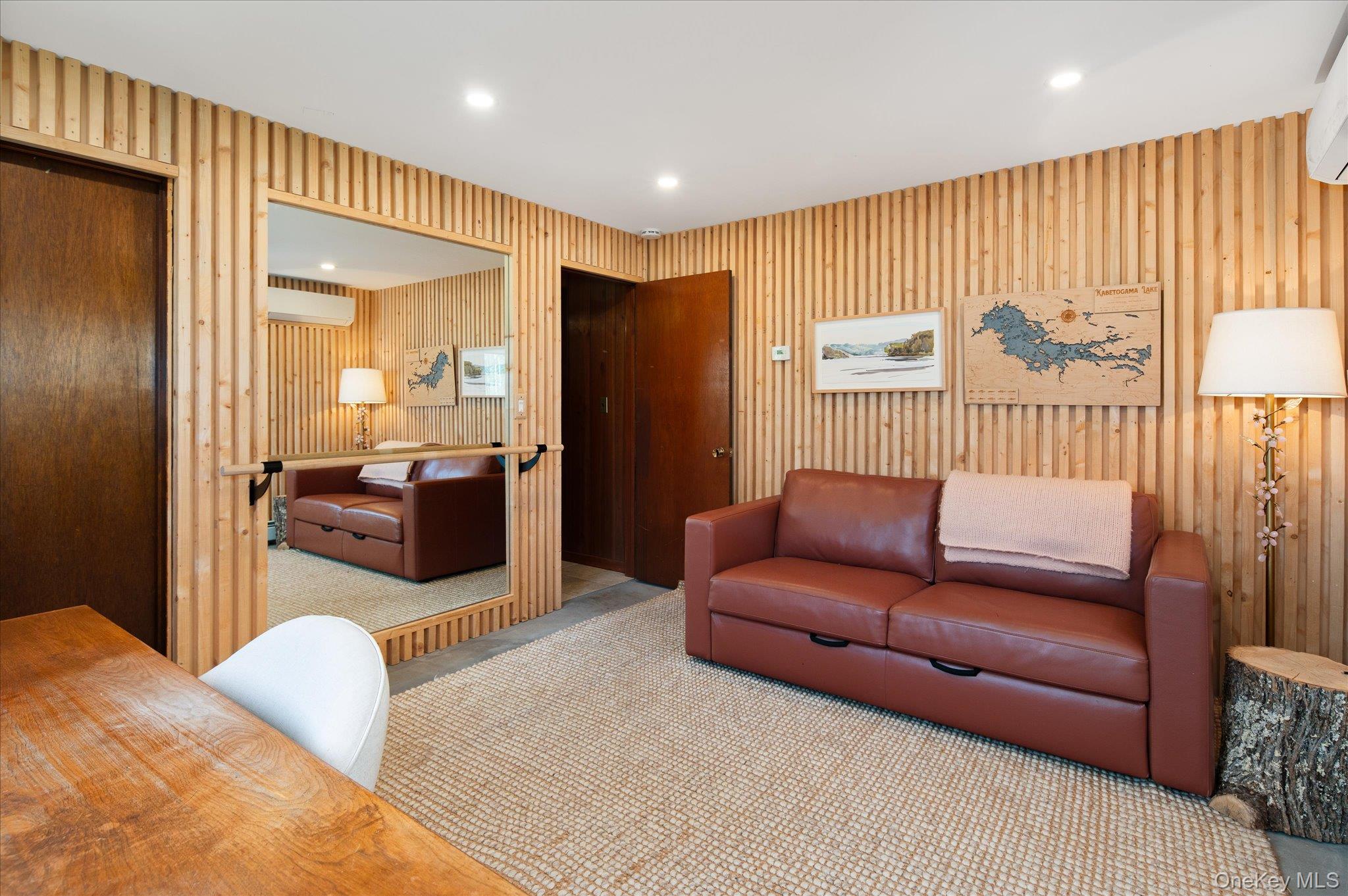 27 Mohawk Lane Baldwin Place, NY 10505 - Photo 29 of 38 a living room with furniture and a flat screen tv