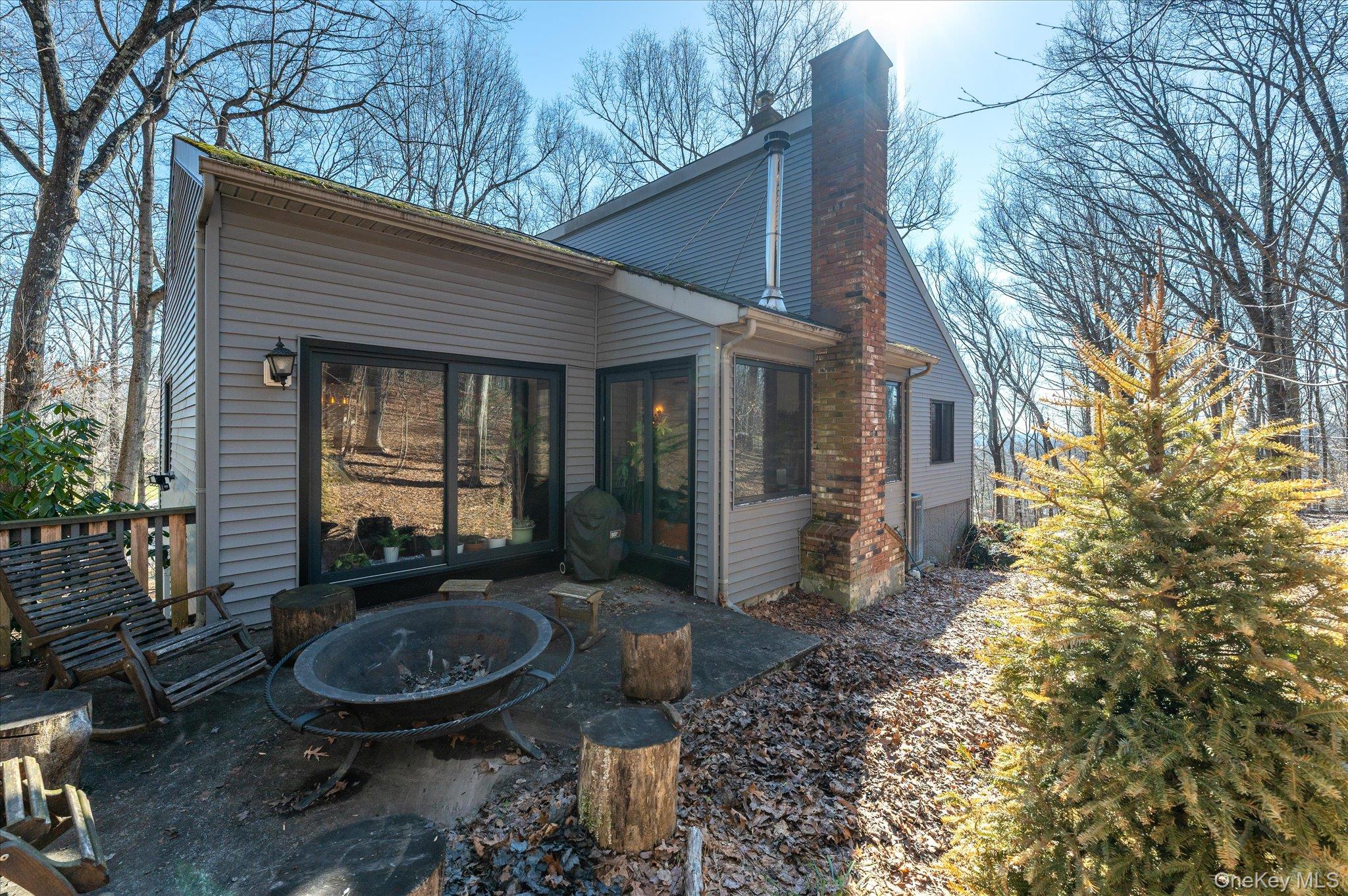 27 Mohawk Lane Baldwin Place, NY 10505 - Photo 36 of 38 a view of house with backyard space and patio