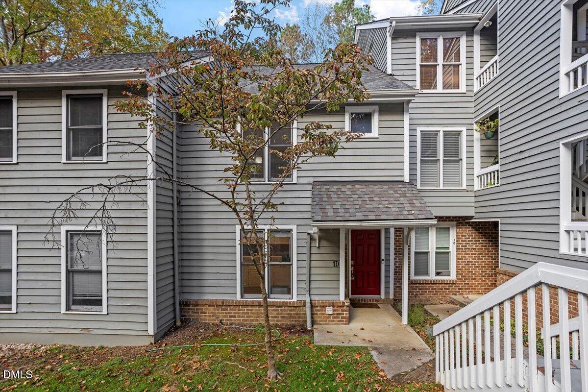 100 Hunting Chase, Unit 1D Cary, NC 27513 - Photo 2 of 29 a front view of a house with a porch