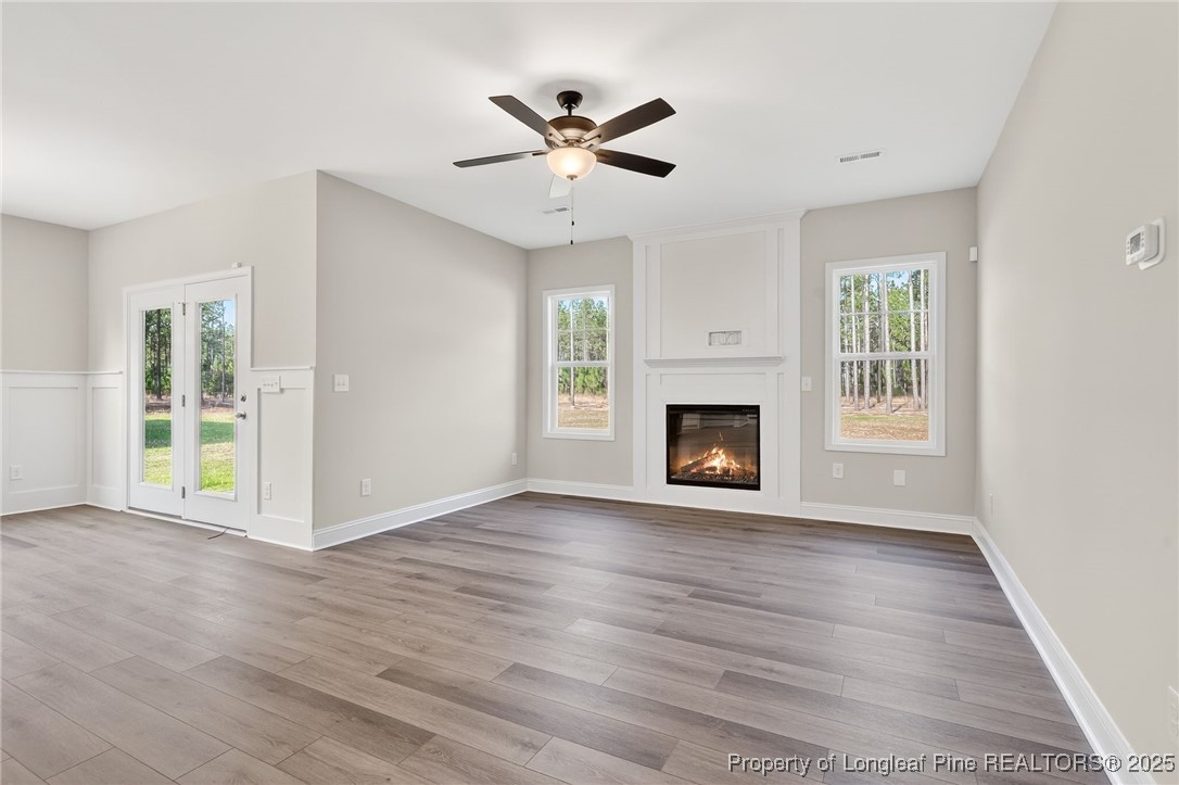 2202 Montrose (lot 3) Road Raeford, NC 28376 - Photo 12 of 44 a view of an empty room with wooden floor and a window