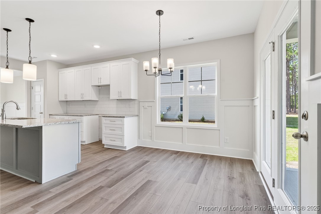 2202 Montrose (lot 3) Road Raeford, NC 28376 - Photo 16 of 44 a view of a kitchen with microwave and cabinets