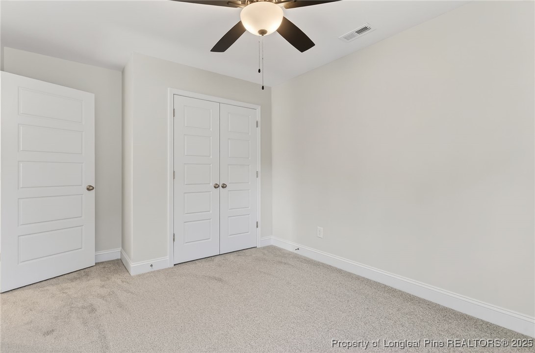 2202 Montrose (lot 3) Road Raeford, NC 28376 - Photo 21 of 44 an empty room with a ceiling fan