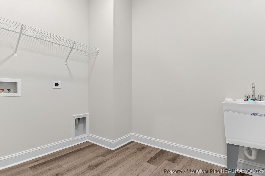 2202 Montrose (lot 3) Road Raeford, NC 28376 - Photo 36 of 44 a view of a room with wooden floor and cabinet