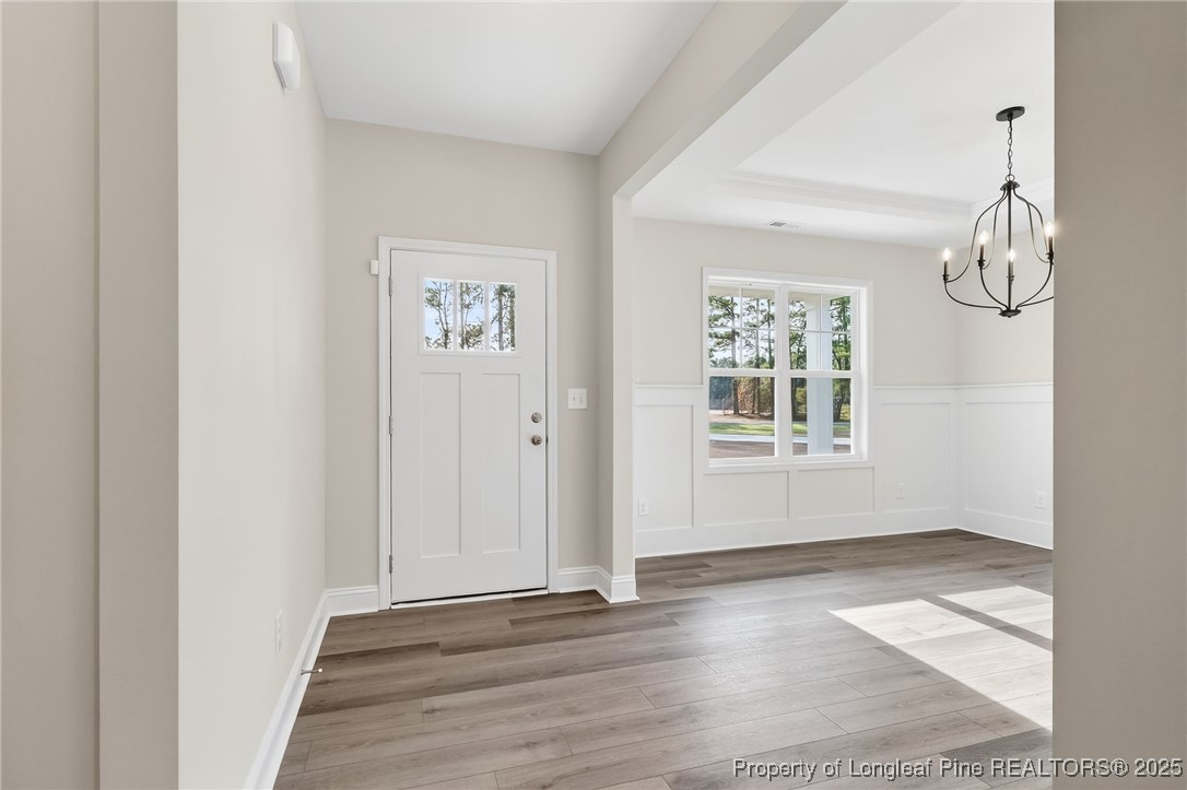 2202 Montrose (lot 3) Road Raeford, NC 28376 - Photo 5 of 44 an empty room with wooden floor and windows