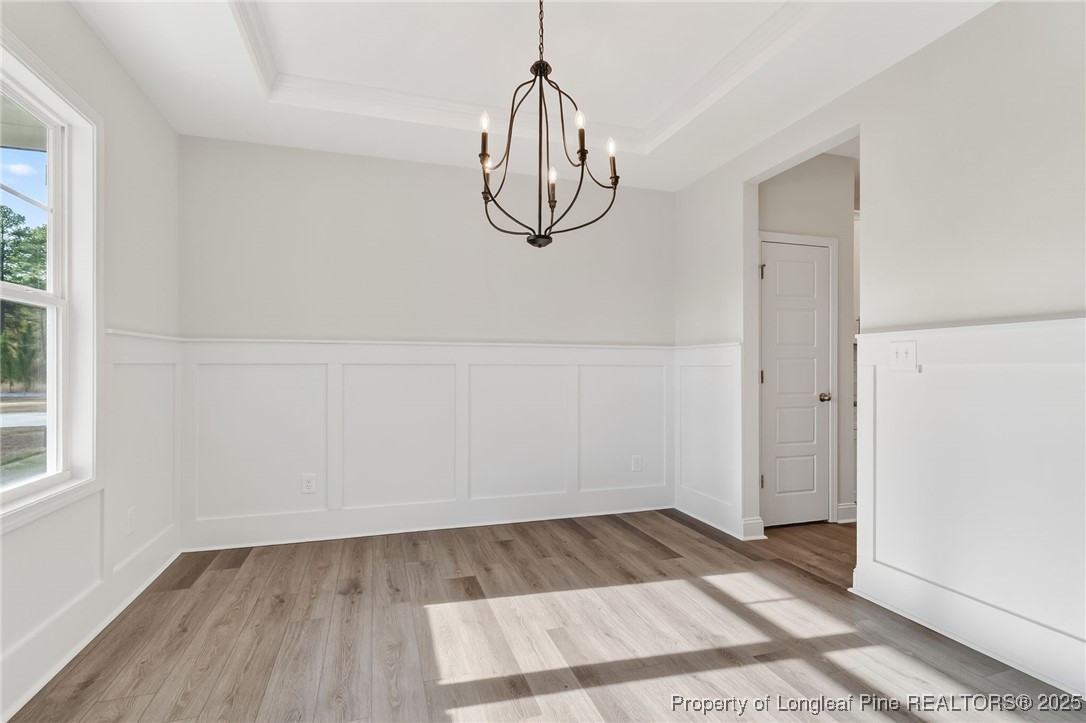 2202 Montrose (lot 3) Road Raeford, NC 28376 - Photo 10 of 44 a view of a room with wooden floor and windows