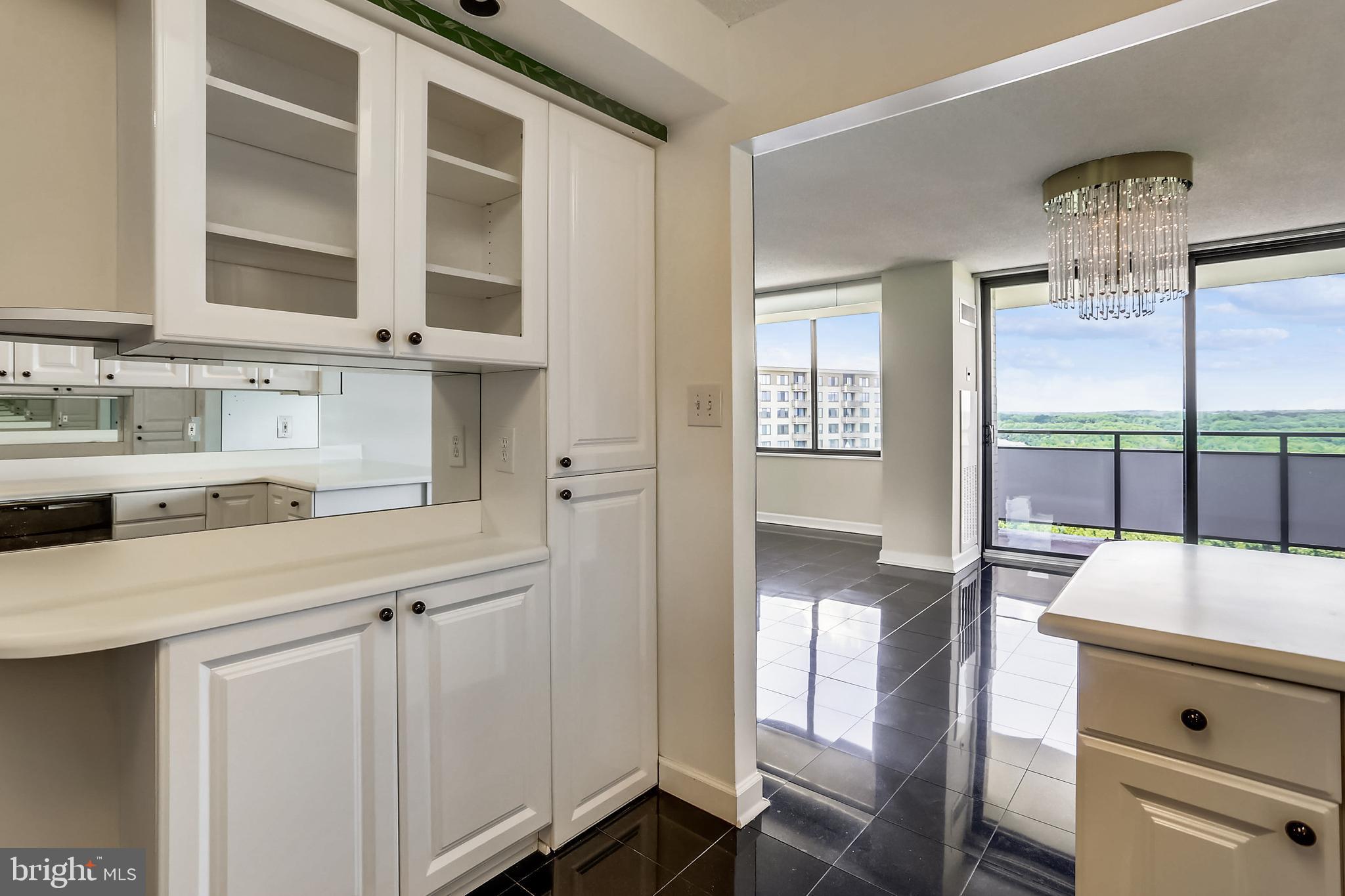 5225 Pooks Hill Road, Unit 1619S Bethesda, MD 20814 - Photo 2 of 54 Kitchen showing opened wall to dining room