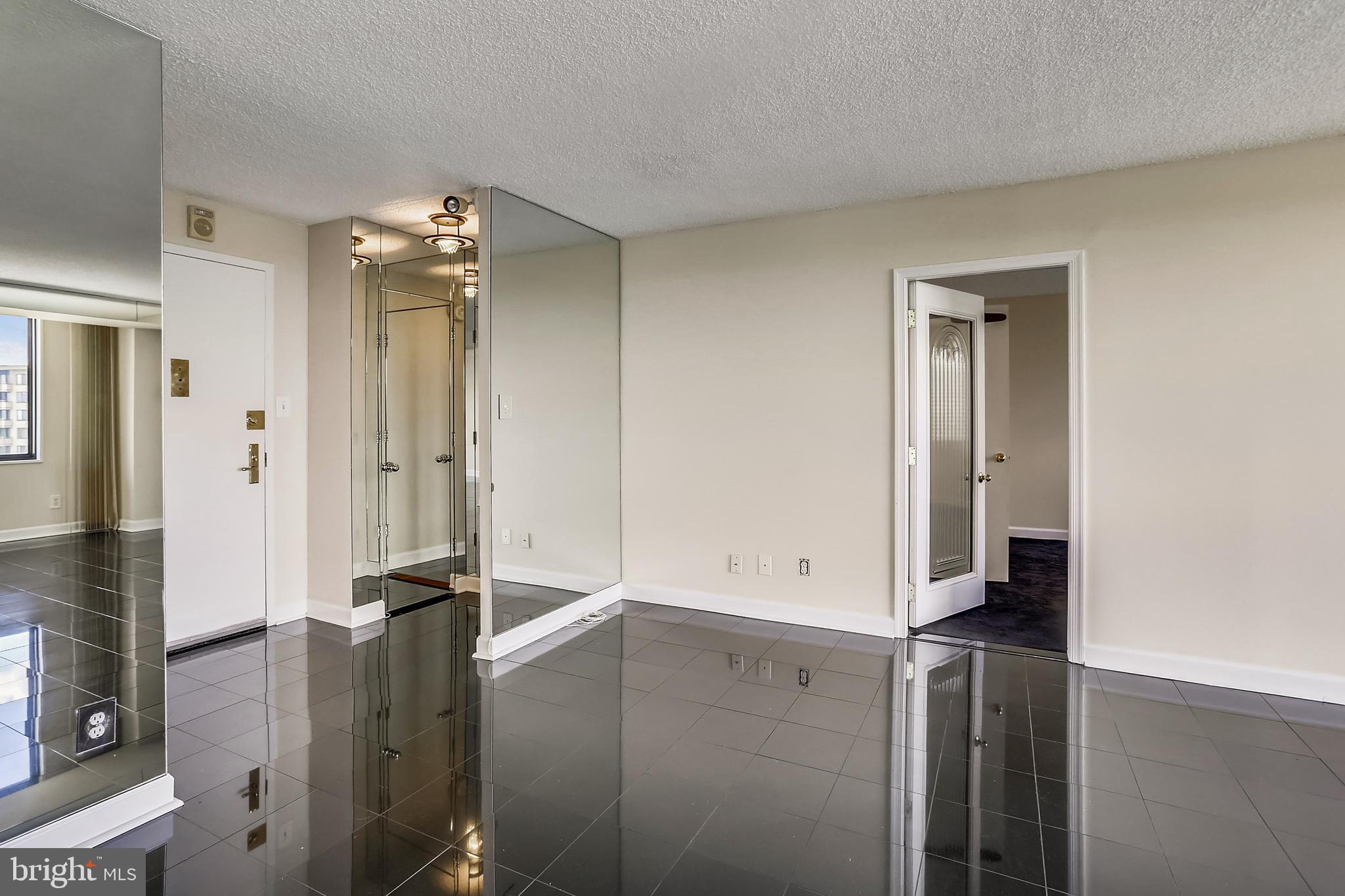 5225 Pooks Hill Road, Unit 1619S Bethesda, MD 20814 - Photo 11 of 54 Living area showing bedroom entry