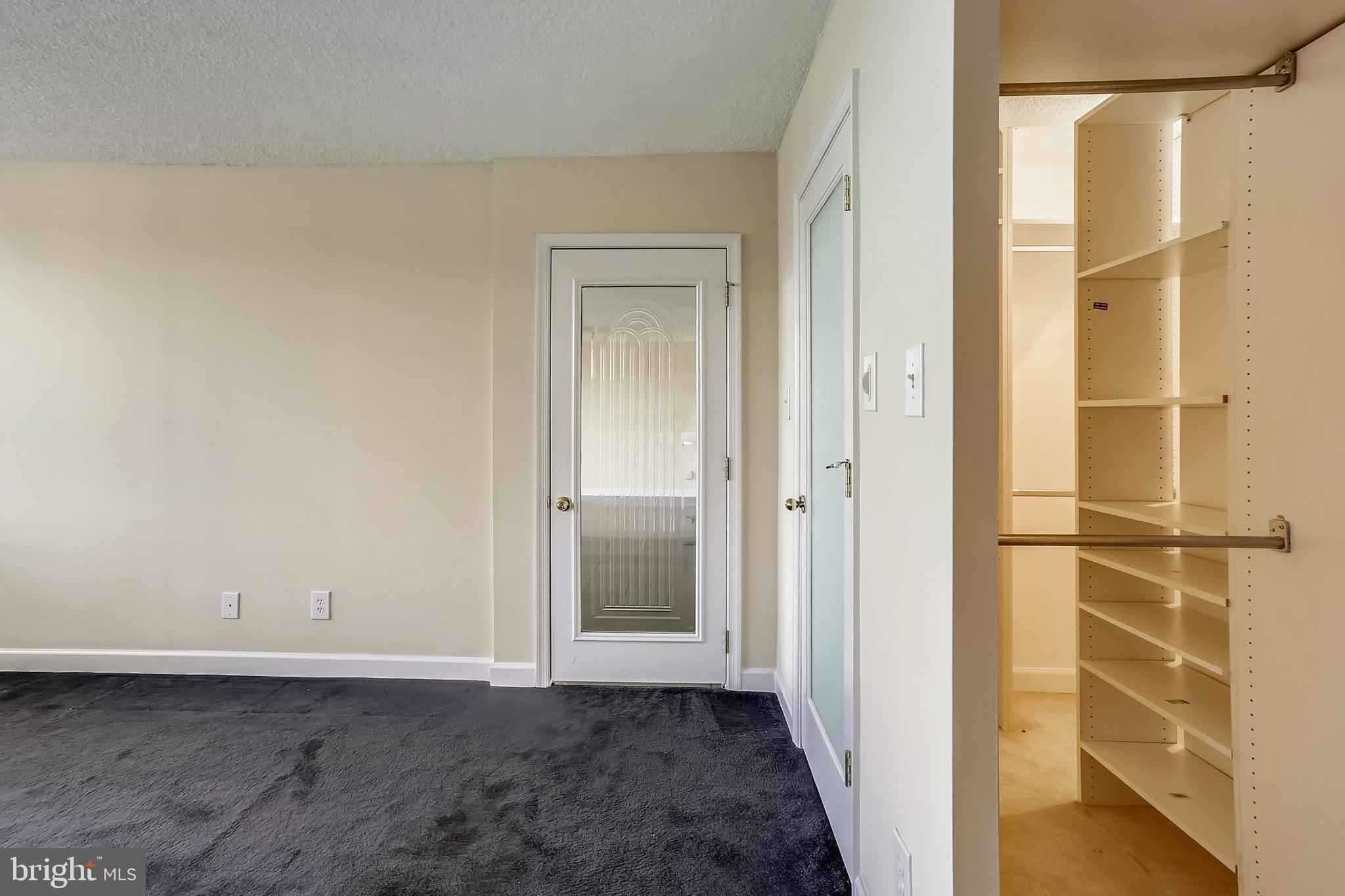 5225 Pooks Hill Road, Unit 1619S Bethesda, MD 20814 - Photo 13 of 54 Bedroom with view of walk-in closet