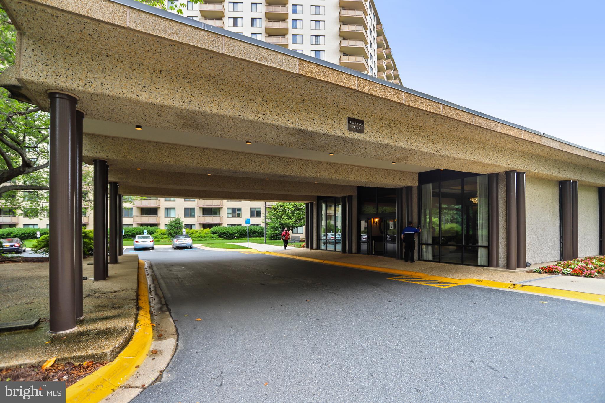 5225 Pooks Hill Road, Unit 1619S Bethesda, MD 20814 - Photo 21 of 54 Promenade with covered driveway