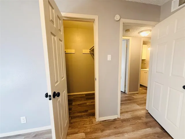 a view of a bathroom with a glass door